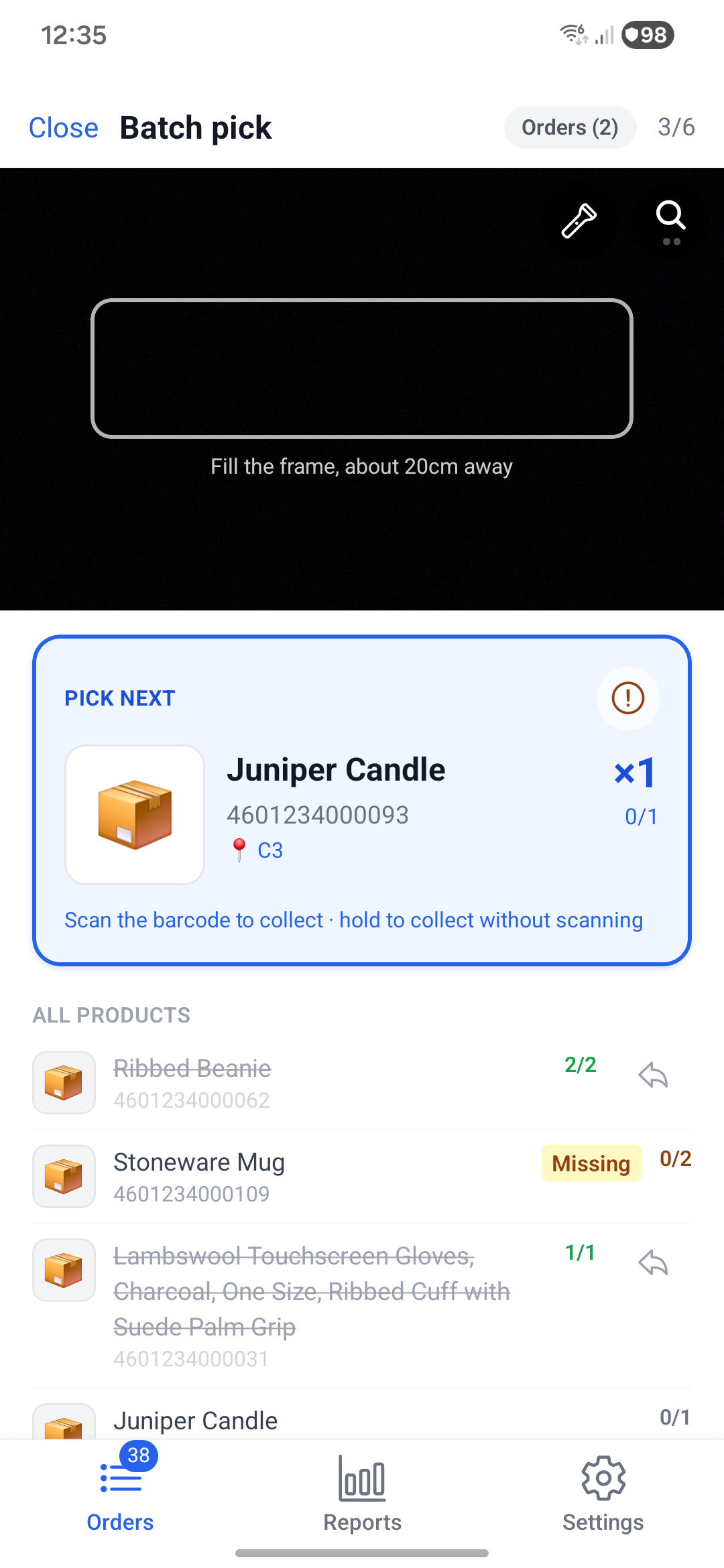The mobile picking screen on a handheld, with the next product to collect highlighted and its quantity.